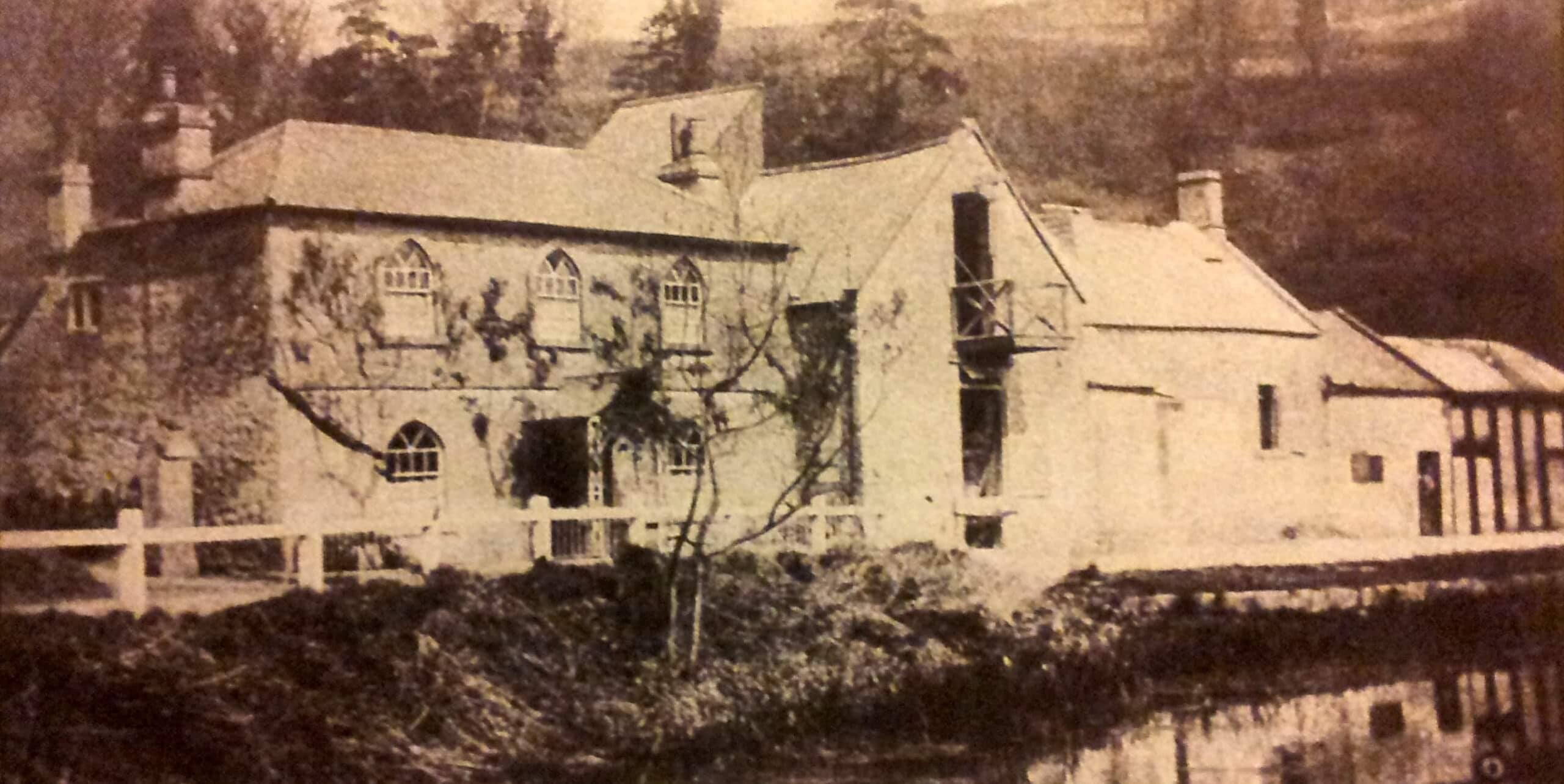 Tucking Mill about 1905 showing the Fuller;s earth factory beside the cottage